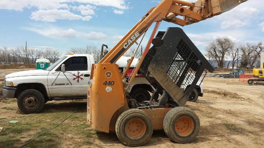 Skid steer loader on site maintenance.