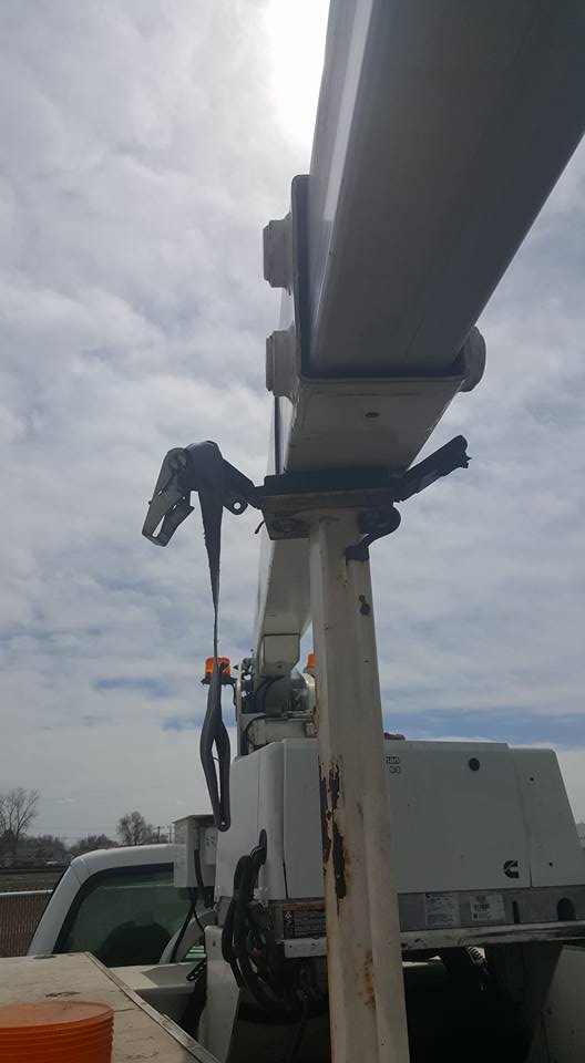 A close-up of white heavy equipment.