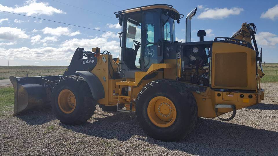 Wheel loader, front-end loader heavy equipment.