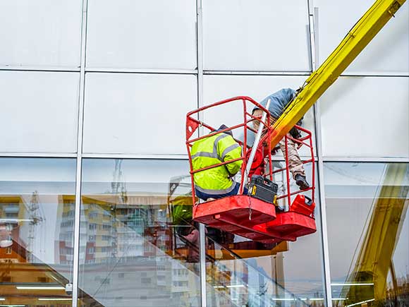 EMT contruction workers on boom lift