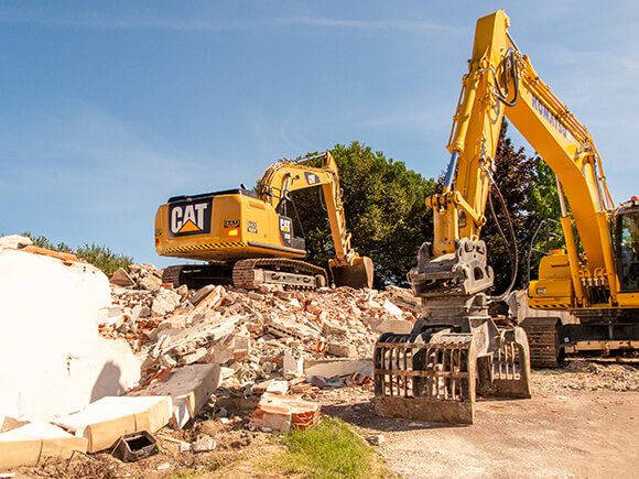 Backhoes on construction site.