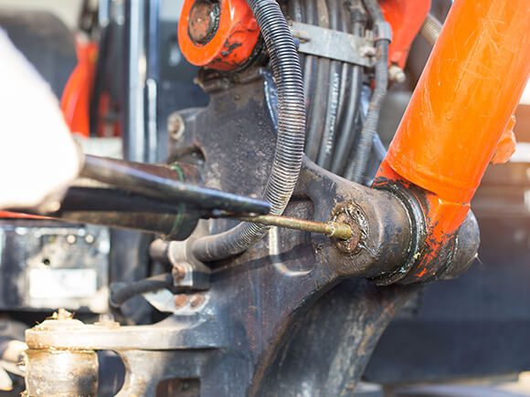 Truck Technician repair Backhoes Side link.