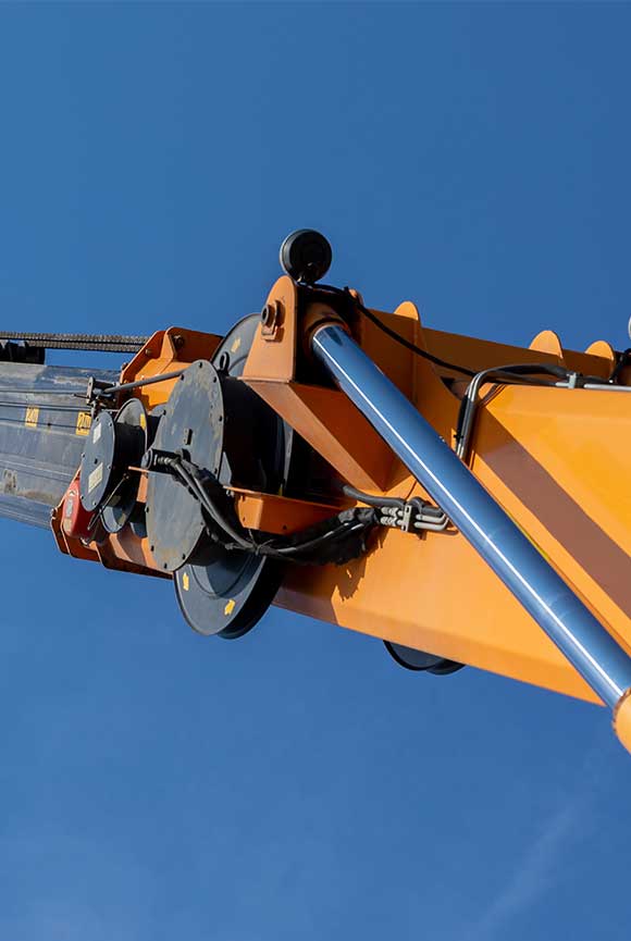 Close-up of aerial lift hydraulic cylinder.