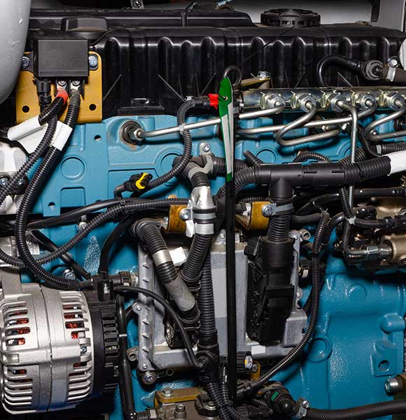 Closeup of modern powerful semi truck turbo diesel engine.