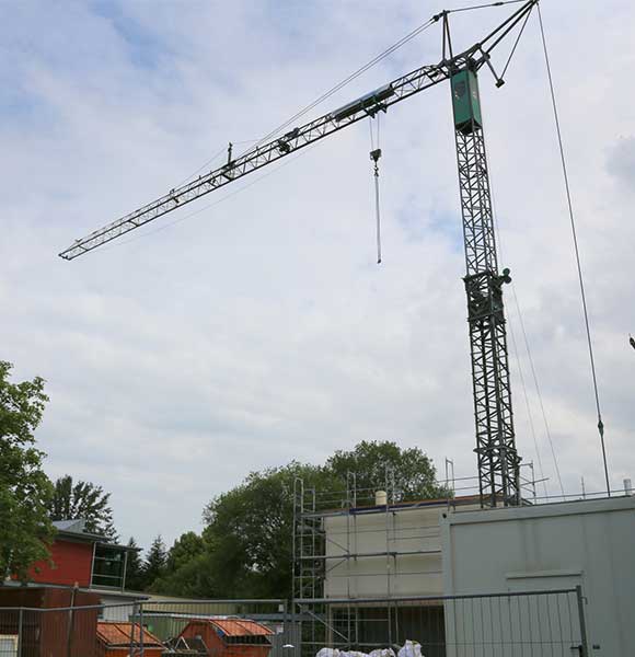 Repair of the building, crane and scaffolding.