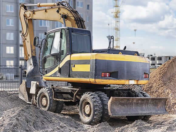 Excavator working on construction site.