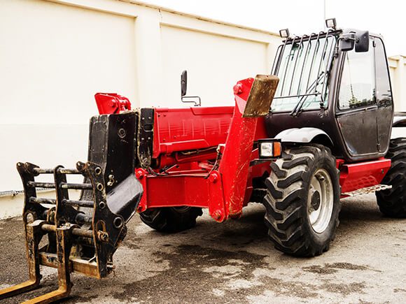 Color Red Rough Terrain Forklift Frontside View