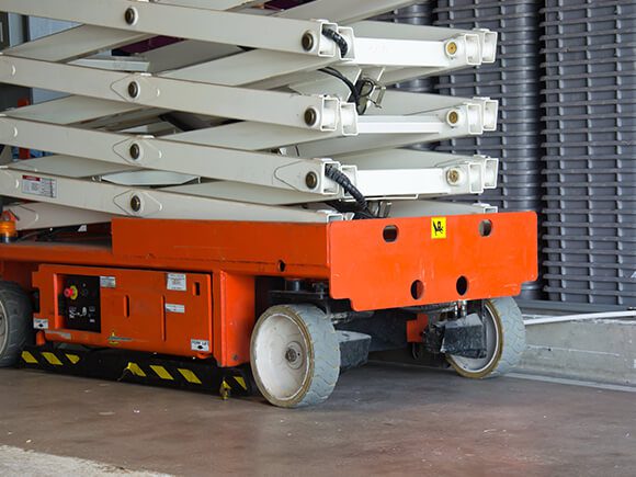 Forklift inside a storage facility.