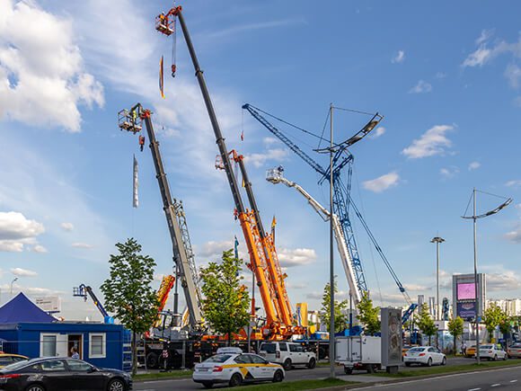 telescopic boom lift on a construction site.